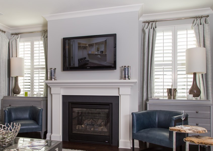 family room Atlanta faux wood shutters